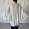 Vista posterior de Wisdom Cape Beige de Triskel